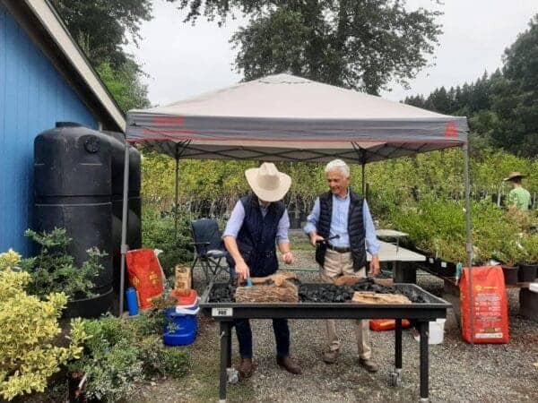Classic Landscaping team socializing at annual company barbecue event