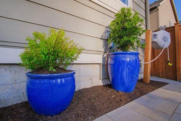 Custom garden pathway with bordered planting beds in Kirkland WA residential landscape design by Classic Landscaping