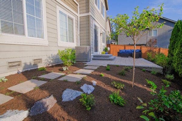 Layered ornamental plantings with seasonal color in Kirkland WA residential landscape renovation by Classic Landscaping