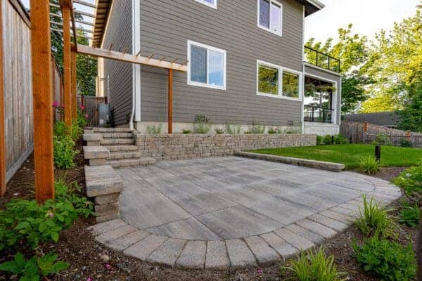 Professionally installed low-maintenance lawn with clean borders and healthy turf in Kenmore landscape renovation