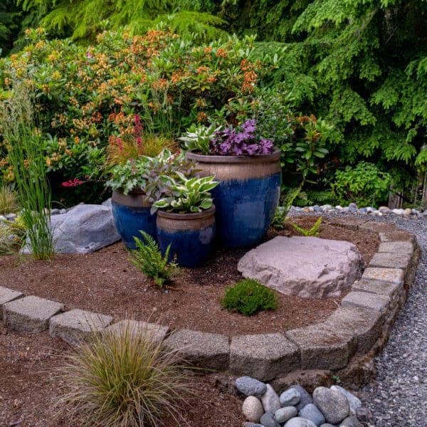 Pacific Northwest modern garden with boulder accent features and drought-tolerant plantings in Sammamish WA