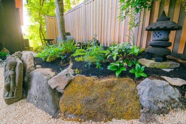 Relaxation Garden featuring contemporary plantings and hardscape elements by Classic Landscaping