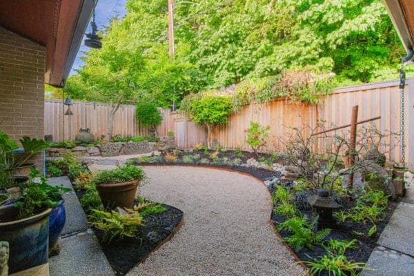 Relaxation Garden featuring outdoor living and contemporary plantings by Classic Landscaping