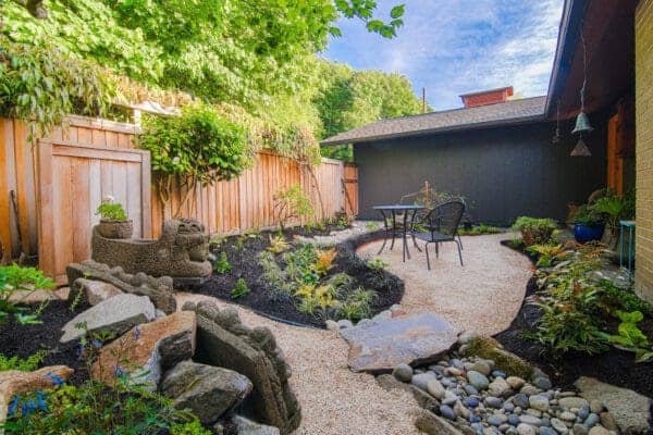 Relaxation Garden featuring contemporary plantings and hardscape elements by Classic Landscaping