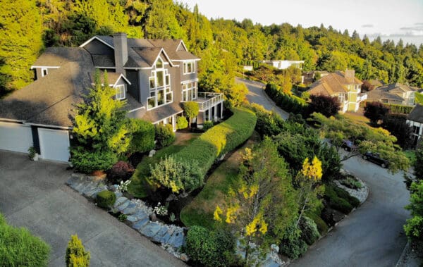 Integrated outdoor living area with garden views and comfortable seating in Greater Seattle lakeview landscape project