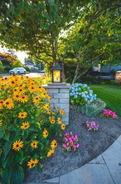 Complete outdoor entertainment landscape with multiple seating areas and garden views in Greater Seattle by Classic Landscaping