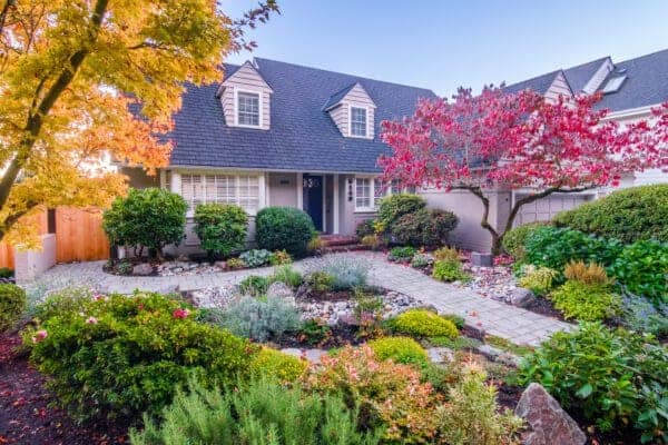 Completed lakeview serenity garden with mature plantings and tranquil water views in Greater Seattle area